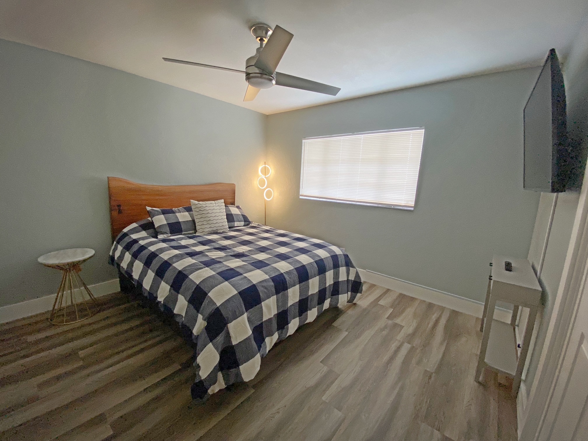 Bedroom with live-edge headboard
