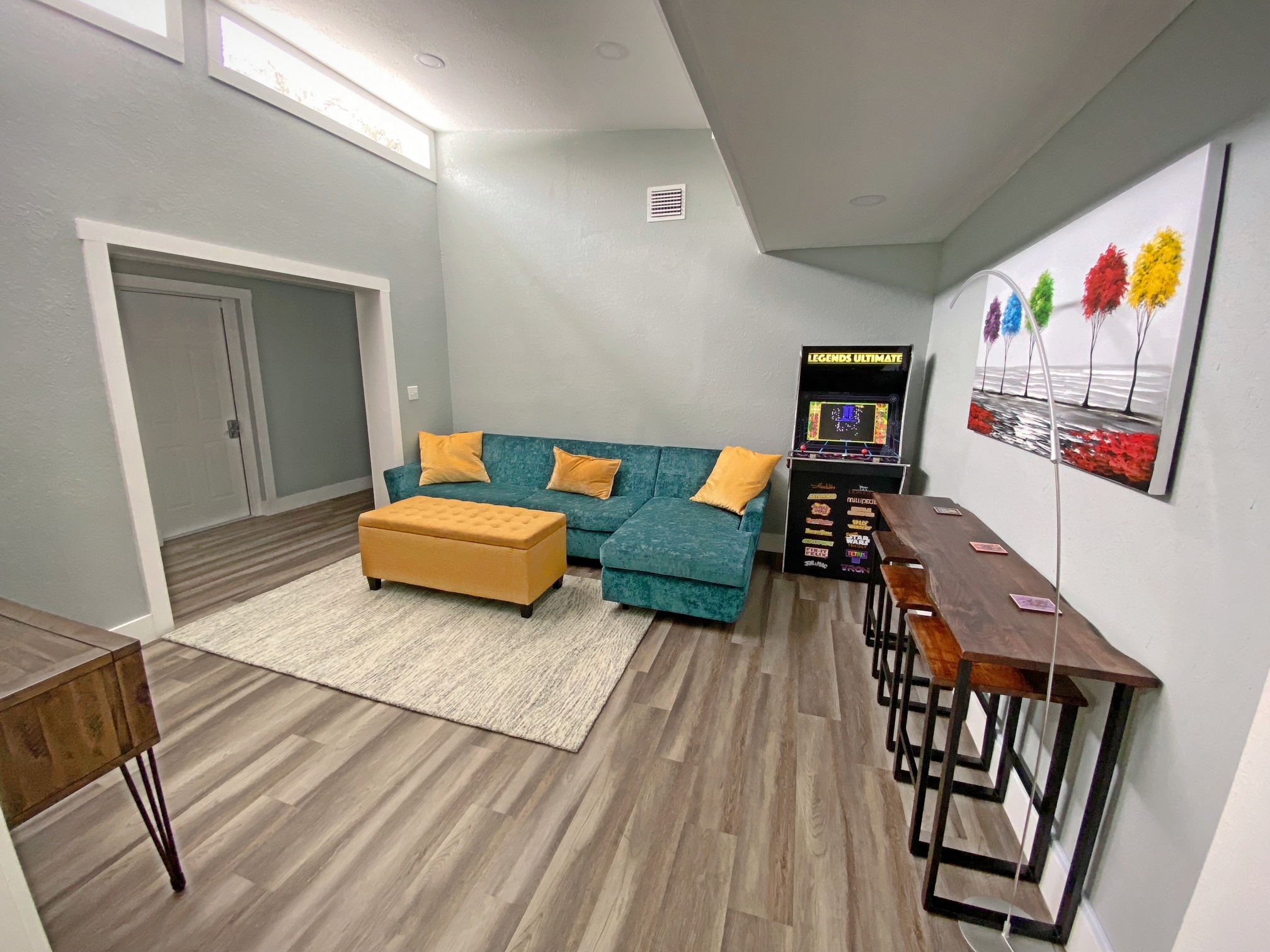 Newly remodeled living room with arcade cabinet